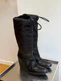 50 / PRADA BOOTS