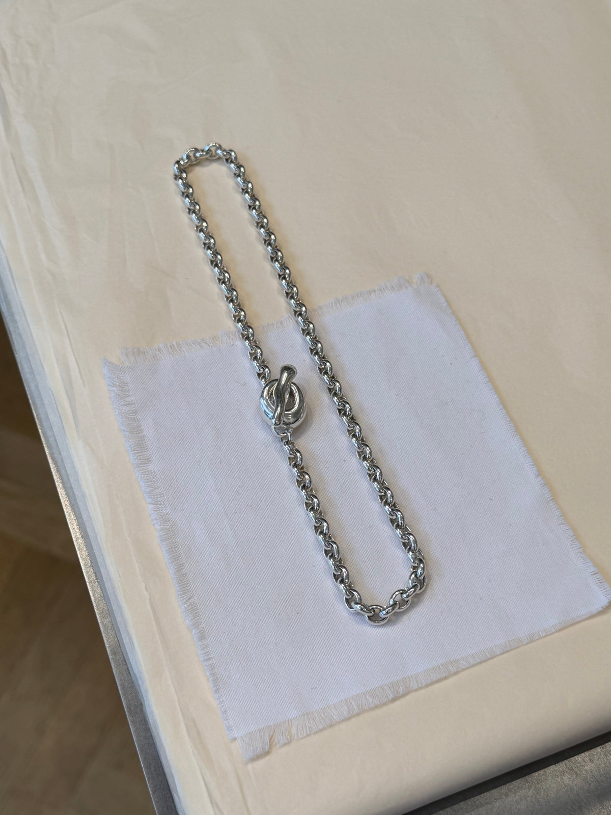 AKVA PUKA BELCHER NECKLACE